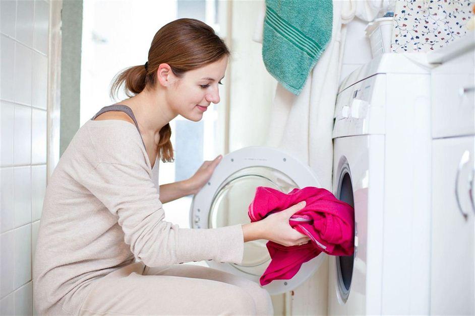 a woman doing laundry