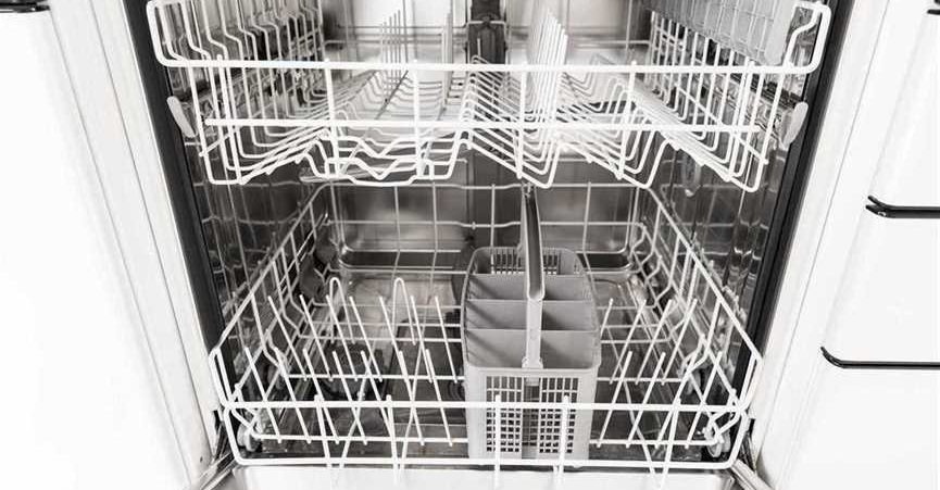 close up of an open dishwasher