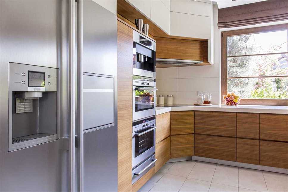 image of a kitchen with a built-in refrigerator