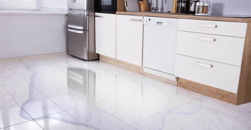 fridge is leaking water into the kitchen floor